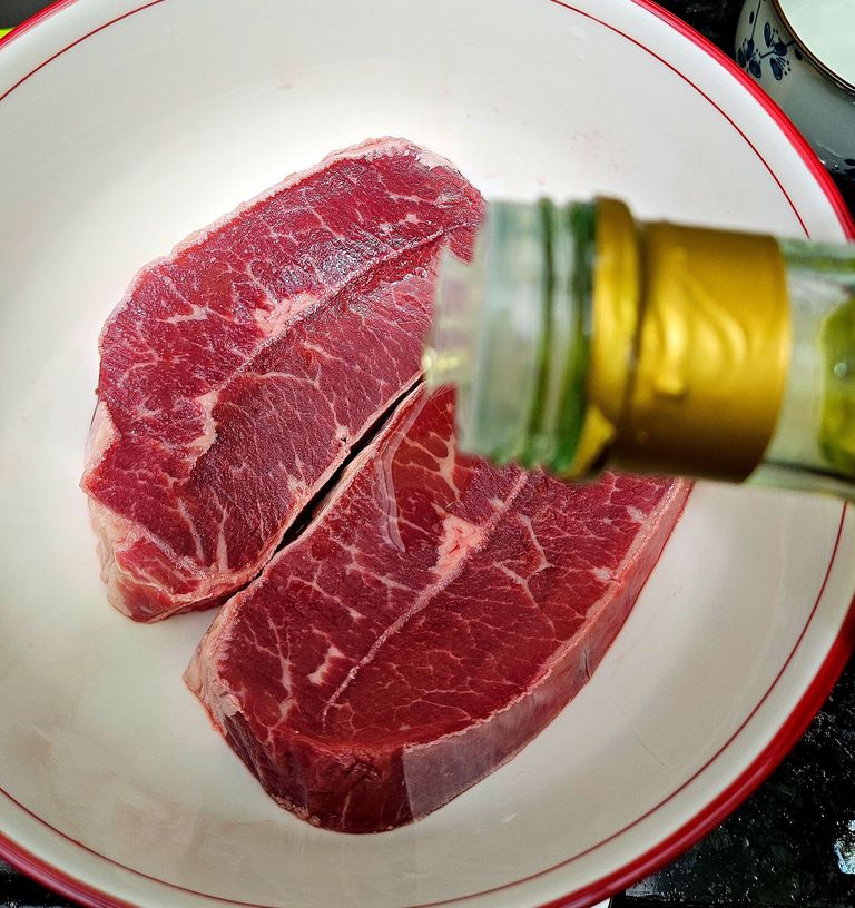 Adding olive oil to flat iron steak