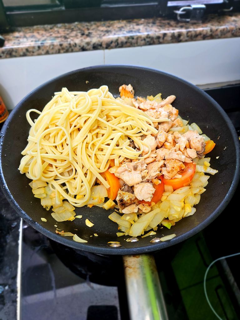 Adding pasta and salmon