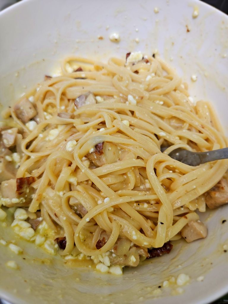 Adding pasta and chicken