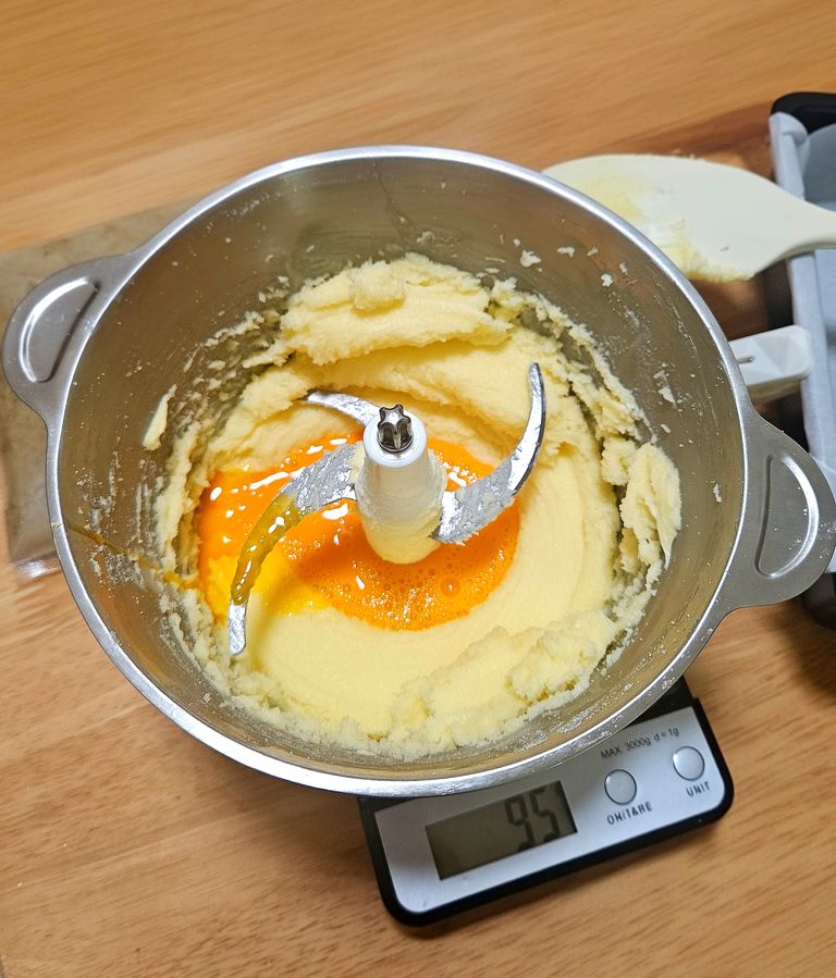 Gradually adding eggs