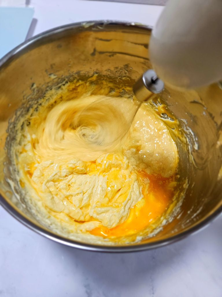 Adding and mixing the eggs