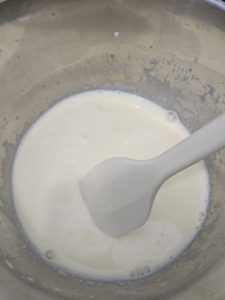 Mix yolk warm milk